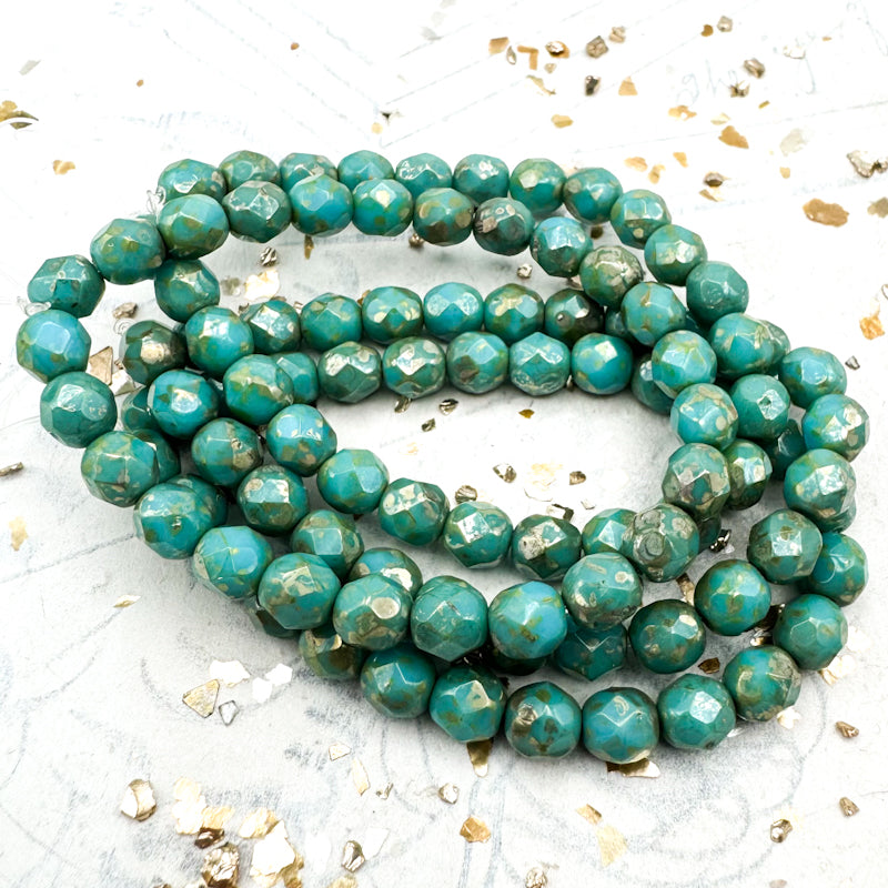 6mm Sea Green with a Picasso Finish Faceted Round Fire-Polished Bead Strand