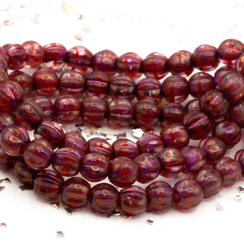 6mm Boysenberry with Gold Luster and Pink Wash Large Hole Melon Bead Strand