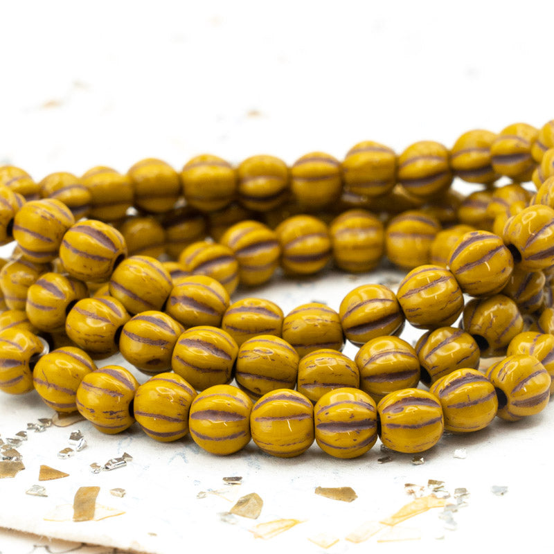 6mm Yellow Gold with a Brown Wash Large Hole Melon Beads