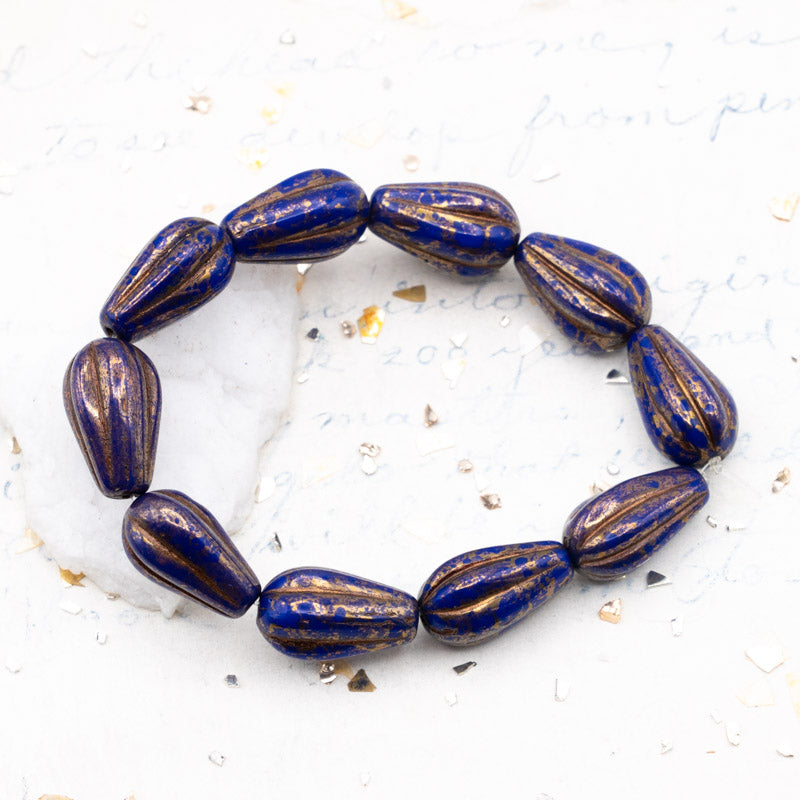 15mm Indigo with a Gold Finish and Bronze Wash Melon Drop Czech Beads
