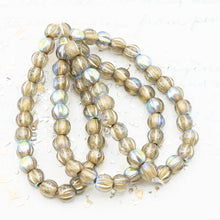 Load image into Gallery viewer, 6mm Gold with AB Finish and Gold Wash Large Hole Melon Bead Strand
