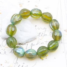 Load image into Gallery viewer, 10mm Peridot with an AB Finish Faceted Melon Bead Strand
