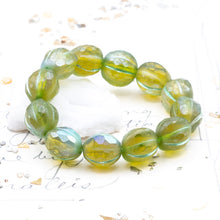 Load image into Gallery viewer, 10mm Peridot with an AB Finish Faceted Melon Bead Strand
