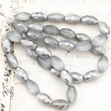 Load image into Gallery viewer, 12x8mm Etched Grey with Silver Finish Faceted Oval Bead Strand
