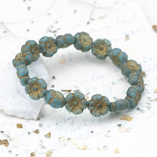 Load image into Gallery viewer, 9mm Etched Sky Blue with a Gold Finish Hibiscus Flower Bead Strand
