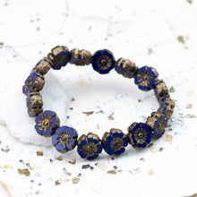 Load image into Gallery viewer, 9mm Indigo with a Gold Finish Hibiscus Flower Bead Strand
