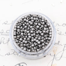 Load image into Gallery viewer, 11/0 Opaque Metallic Frosted Antique Silver Round Seed Beads
