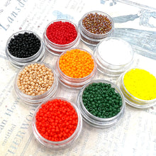 Load image into Gallery viewer, Flower &amp; Leopard Rosettes Seed Bead Bundle - 9 Colors
