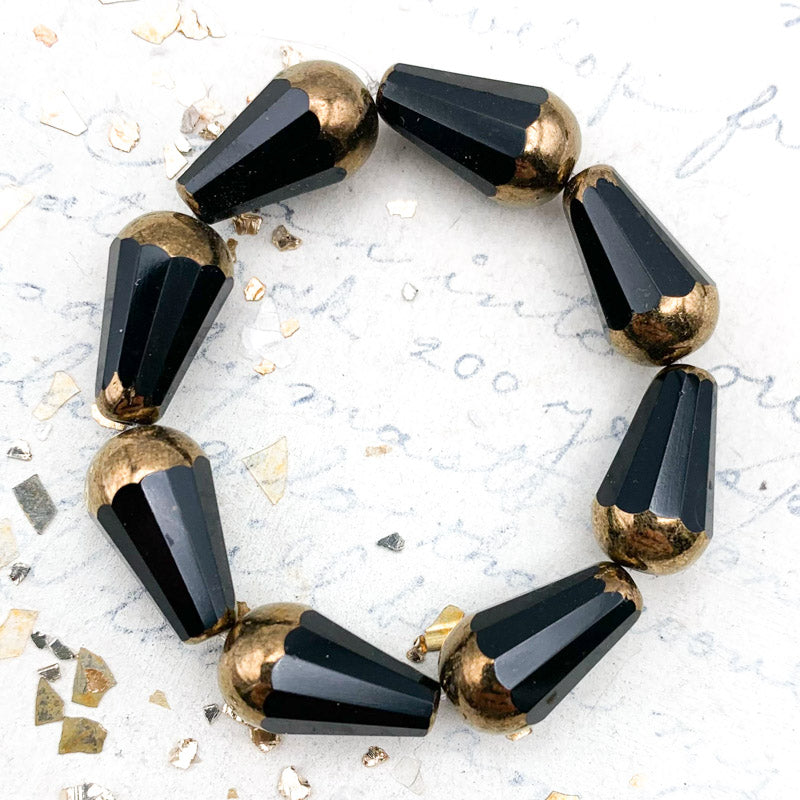 8x15mm Black with Bronze Finish Faceted Drop Czech Bead Strand