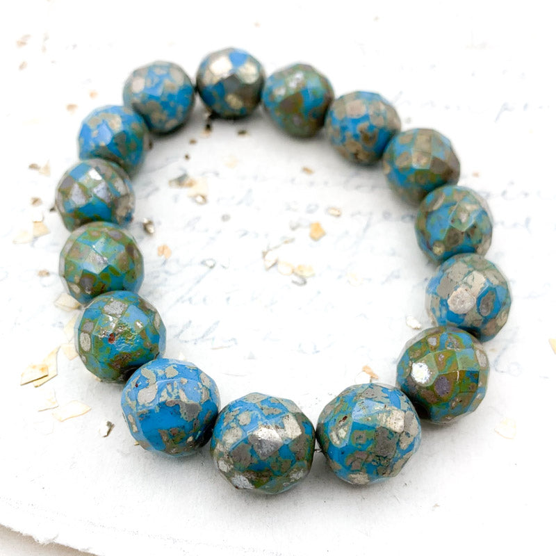 12mm Pacific Blue with Picasso Faceted Round Bead Strand