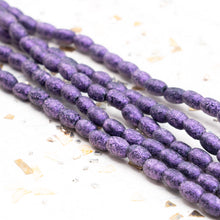 Load image into Gallery viewer, 4x6mm Etched Pastel Purple Rice Shaped Bead Strand
